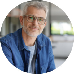 Middle-aged guy with eyeglasses and blue shirt